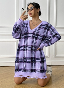Detail of V-neck plaid knit sweater dress with unique distressed hemline design