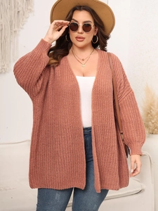 Women's dusty pink chunky knit cardigan sweater with a relaxed open-front fit for fall