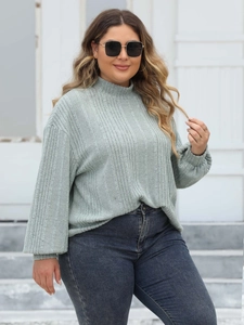 Sage green ribbed long sleeve turtleneck top for women paired with high waist jeans