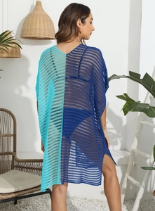 Detail view of two-tone blue crochet beach cover-up with mesh hollow out and side slit