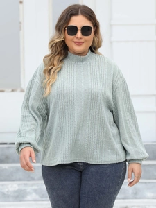 Chic mint green ribbed oversized sweater for women with turtleneck and puff sleeves