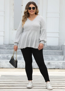 Detail of grey V-neck plus size top with ribbed texture and elegant lantern sleeves
