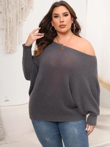 Detail of grey off-shoulder batwing sleeve sweater featuring horizontal knit texture design