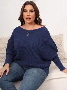 Detail of navy blue oversized batwing sleeve sweater with textured knit and boat neck