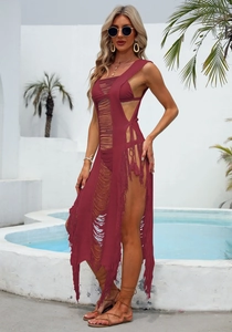 Detailed close-up of burgundy crochet beach cover-up with hollow knit and side ties