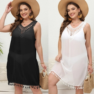 Close-up of crochet V-neck hollow design and tassel hem on chiffon beach cover-up dress
