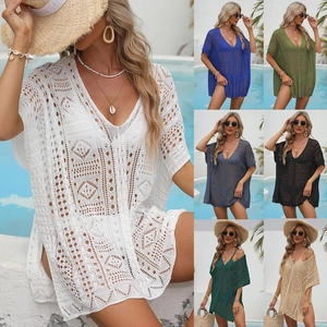 Detailed close-up showing crochet texture and hollow design of V-neck beach cover-up