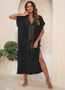 Detail of V-neck crochet lace stitching and side slit on this black beach cover-up maxi dress