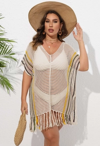Detail of bohemian striped crochet beach cover-up with V-neckline and fringe hem