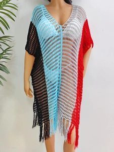 Detail of V-neck crochet cover-up dress featuring colorful vertical stripes and tassels