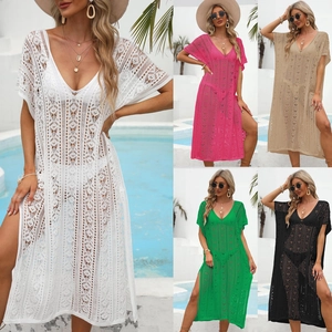 Detailed knit pattern of a deep V-neck crochet beach cover-up dress in multiple colors