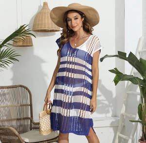 Detail of blue and white striped crochet knit texture with stylish hollow-out beachwear pattern