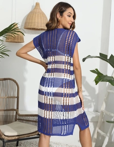 Detail of blue and white striped knit texture on a breathable beach cover-up dress