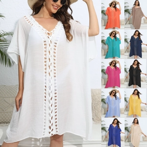 Detail view of V-neck beach kaftan cover-up with crochet panels in 11 vibrant color options