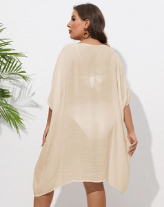 Vue de dos du cache-maillot de plage beige oversize avec manches chauve-souris