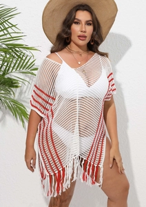Detail of white crochet beach cover-up with red stripes and fringe hem decoration