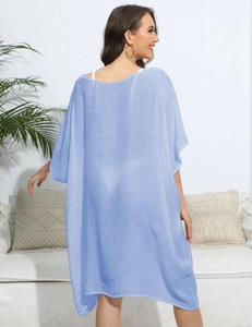 Rear view of loose light blue chiffon cover up with vertical pleated texture for beach