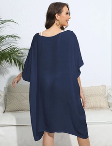 Back view of loose dark blue chiffon beach cover-up with oversized batwing sleeves