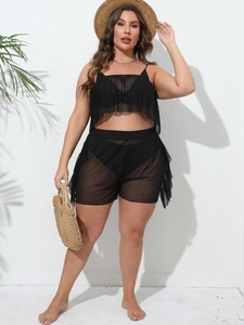 Detail of plus size black mesh cover-up set with ruffle top and sheer shorts for beach wear