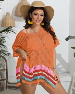 Detail of crochet knit beach cover-up with multi-color stripes and side slit design