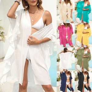 Detail of ruffle sleeve beach cover-up cardigan showing available colors in various shades