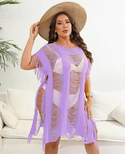 Detail of light purple crochet beach cover-up with hollow stripes and tassel hem details