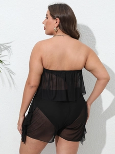 Detail view showing the layered ruffles and sheer mesh texture of the black plus-size beach set