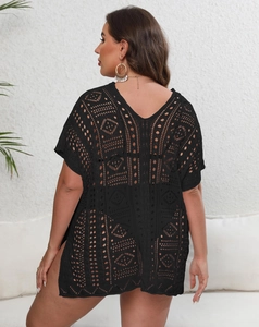 Detailed back view of a black crochet hollow-out beach cover-up with geometric patterns