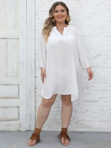 Deep V-neck white beach cover-up dress in breathable fabric with curved hem details