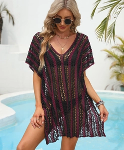 Detail of crochet knit beach cover-up with purple and black striped hollow patterns