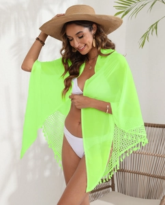 Detail of neon green chiffon beach cover-up with mesh hollow out and tassel trim fringe