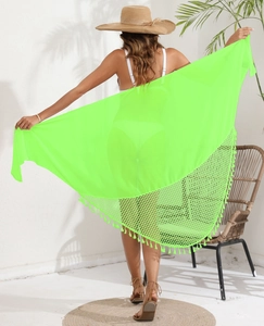 Detail of lime green chiffon beach wrap skirt featuring mesh weave and long fringe tassels