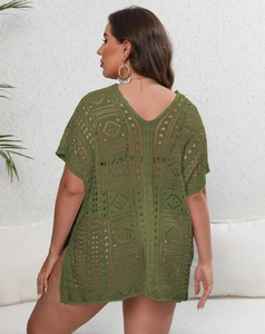 Detailed macro view of military green crochet knit fabric with geometric hollow patterns