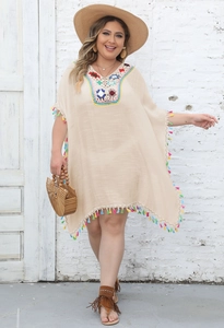 Detail view of Bohemian plus size beach cover-up with colorful embroidery and tassels