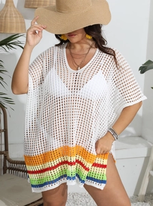 Detailed knit texture and vibrant rainbow striped hem of white crochet beach cover-up dress