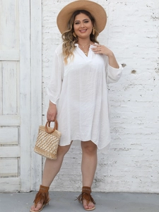 Deep V-neck white beach cover-up dress in breathable fabric with casual resort styling
