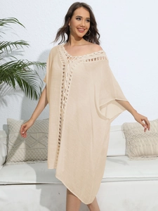 Beige bohemian crochet hollow out beach cover up dress with V-neckline and loose fit