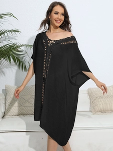 Women's black loose beach cover-up dress with hollow crochet detailing and V-neckline