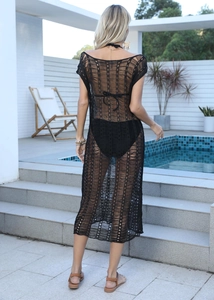 Detailed back view of black crochet beach cover-up dress with hollow knit pattern
