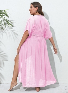 Detail of light pink sheer beach cover-up with lace embroidery and side slit detail