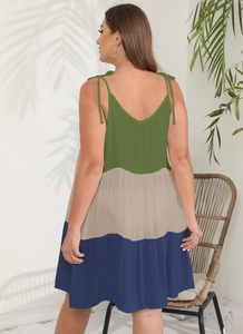 Detail of color-block patchwork sundress with adjustable shoulder tie-up straps