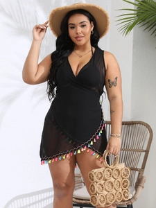 Plus size black mesh beach cover-up dress with colorful tassel trim and wrap style