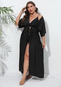 Detailed view of women's plus size black lace beach cover-up with waist hollow design