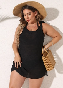 Detail of plus size black beach cover-up with tie-shoulder straps and woven texture