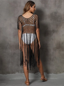 Women's black hollow crochet beach cover-up with long tassel fringe and open back design
