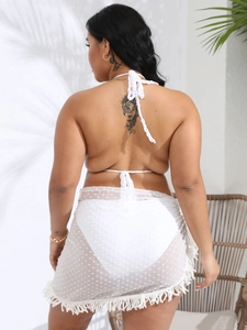 Back view of a white crochet halter bikini set with sheer mesh tassel skirt for beachwear
