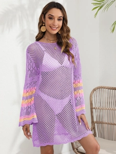 Detailed close-up of crochet hollow out mesh texture on lavender beach cover-up dress