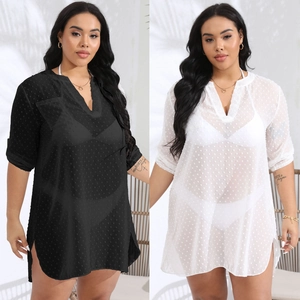 Detail of V-neck plus size chiffon cover-up with swiss dot texture in black and white