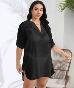 Close-up of black sheer polka dot chiffon beach cover-up with side slit and V-neckline