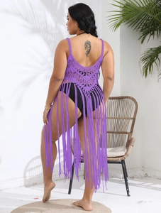 Detail view of purple crochet beach cover-up with hollow knit and long fringe tassels